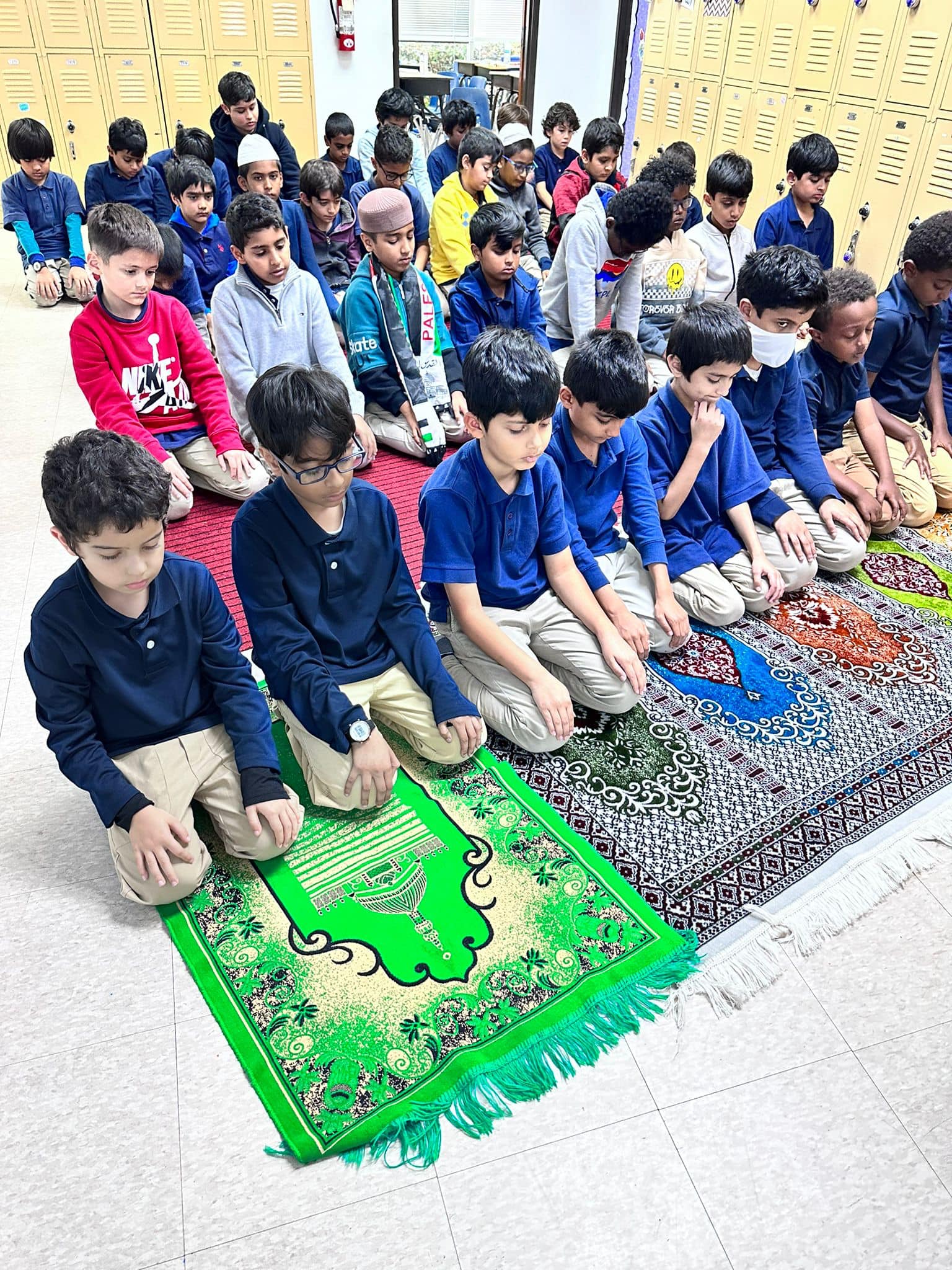 Students praying at Salam Academy